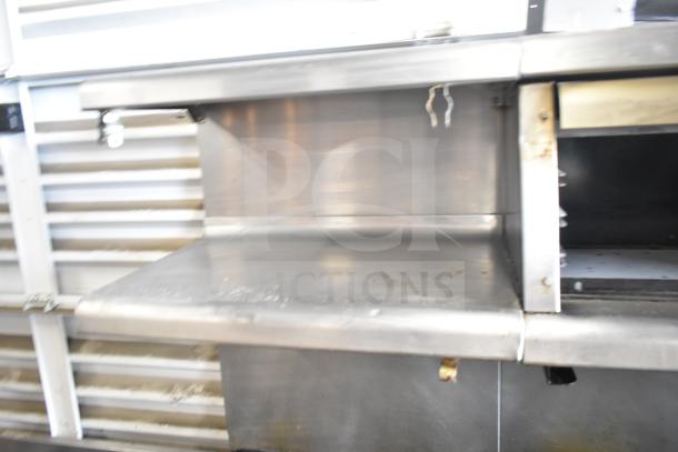 Vulcan ESB60 commercial electric range with 10 burners, 2 ovens, and salamander cheese melter. 208V, 3-phase.