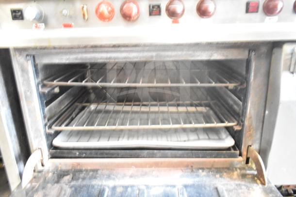 Vulcan ESB60 commercial electric range with 10 burners, 2 ovens, and a salamander cheese melter. 208 Volts, 3 Phase.