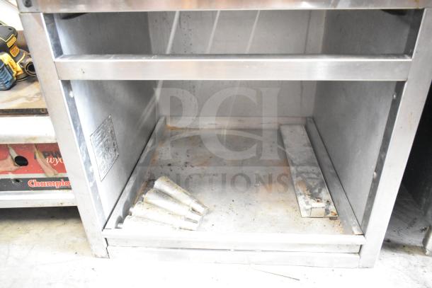 Wolf SCB25F-1 commercial gas charbroiler grill, missing grates, used condition, stainless steel frame, clear model tag.