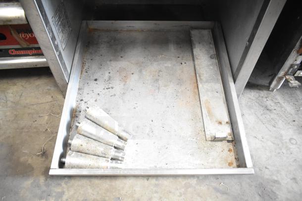 Wolf SCB25F-1 commercial gas charbroiler grill, missing grates. Visible rust on surfaces.