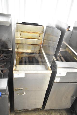 Pitco Frialator commercial natural gas fryer with 2 side splash guards, 90,000 BTU. Used, showing wear and grease buildup.