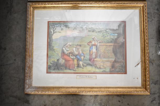 Framed picture with pastoral scene, gold ornate frame, titled "Costumi Di Caserta." Slight wear on frame edges.