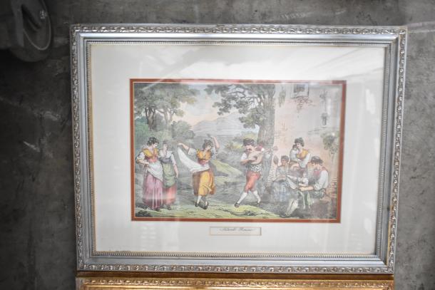 Framed picture depicting a lively outdoor scene with dancers and musicians. Ornate silver and gold frame, labeled "Italian Romance."