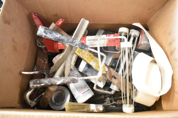 Box of mixed items including tools, paint supplies, white poly buckets, and air pot. Various conditions. Tags visible, indicating brands like Rust-Oleum.