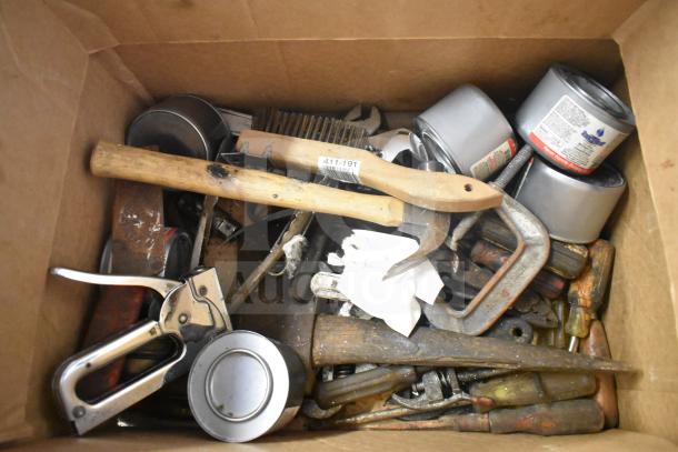 Lot of assorted tools and supplies in a box, including hammers, brushes, cans, and clamps. Condition: Used.