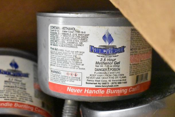 Auction lot including various items: methanol gel cans by Fancy Heat, white poly buckets, air pot, lights, paint rollers, brushes, tools.