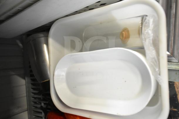 Various items including white poly buckets, air pot, and trays, stacked on a shelf. Mixed lot in used condition.