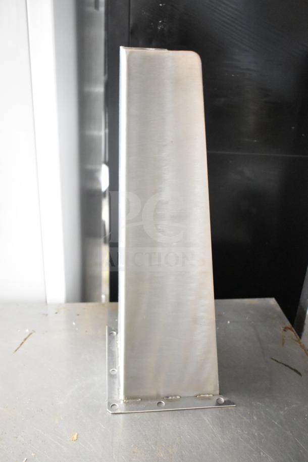 New industrial metal leg, brushed finish, rectangular shape, mounting plate with holes. Ideal for furniture or equipment support.