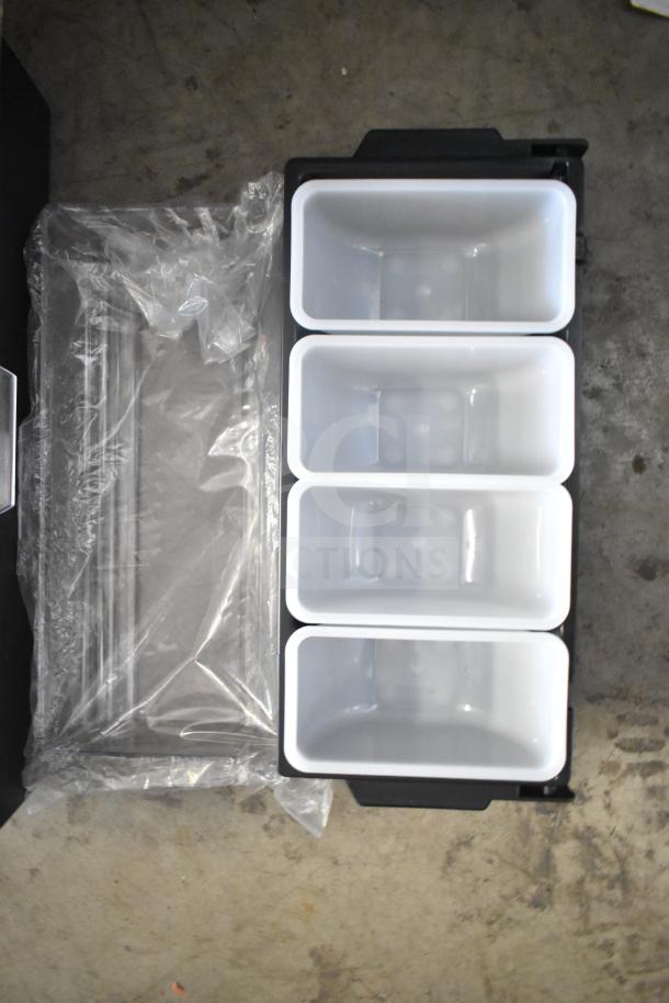 Four white plastic containers in a black rack. Clear packaging visible on the left. Items are unused and ready for use.