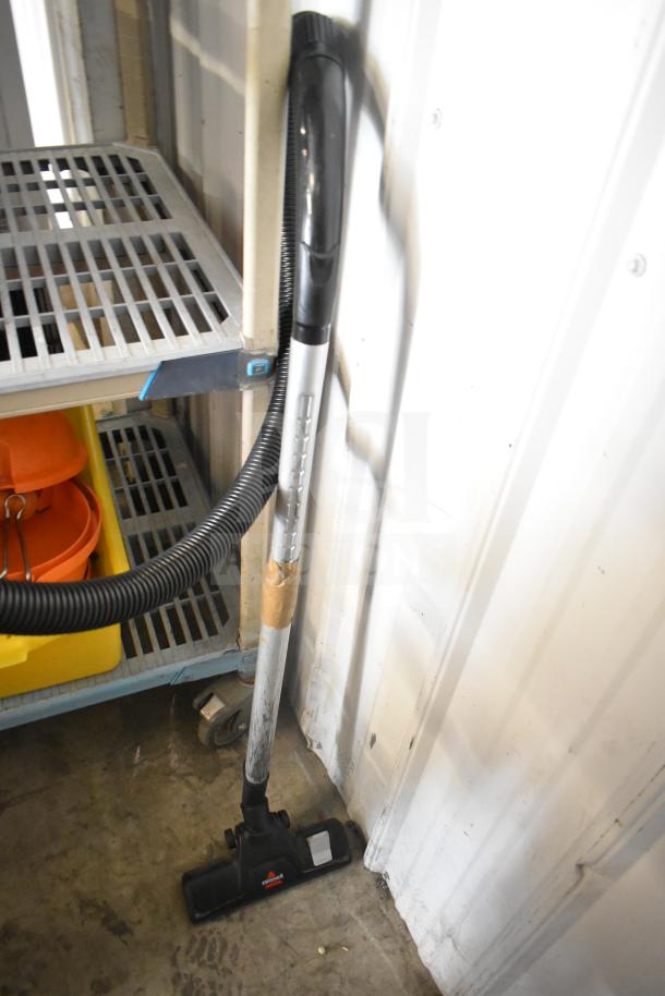 Bissell 4122 Zing Vacuum Cleaner, 120V, used condition, telescopic wand, flexible hose, visible Bissell branding.