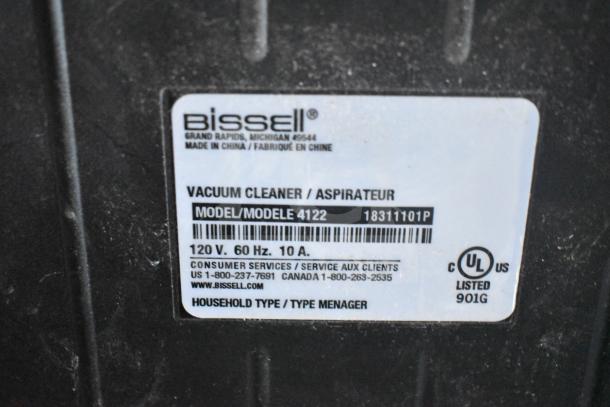 Bissell 4122 Zing Vacuum Cleaner label showing model, 120V, 60 Hz, 10A specs, and UL certification.