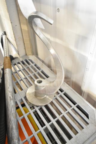 Commercial dough hook for Hobart mixer, metal, spiral shape, good condition, ideal for heavy-duty mixing tasks.