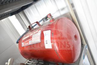 Red Midwest Products Portable Air Tank, 9-gallon capacity, handle and valve visible, labeling intact and legible.