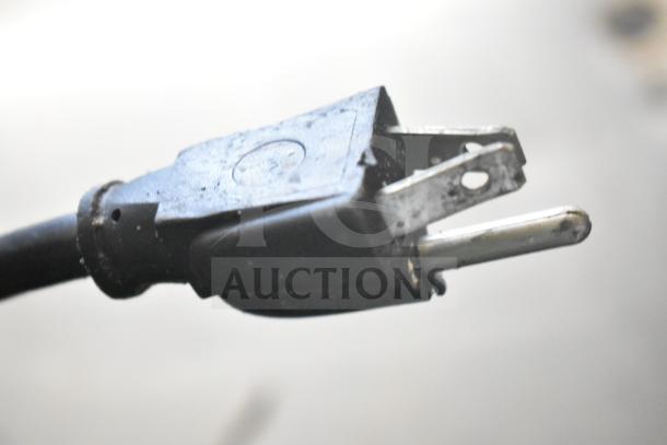 Close-up image of the power plug for a Beverage Air UCR27A commercial undercounter cooler, 115 volts, 1 phase.