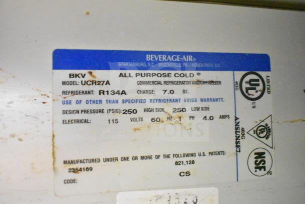 Beverage Air UCR27A undercounter cooler label, detailing model, refrigerant R134A, 115V, 1 phase specs, NSF, UL listed.