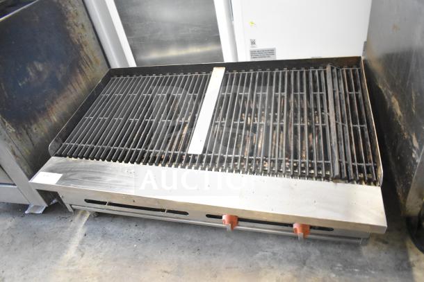 Sierra Commercial Countertop Gas Charbroiler Grill with stainless steel body, two red control knobs, and visible wear.