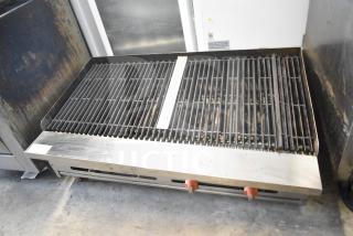 Sierra Commercial Countertop Gas Charbroiler Grill with stainless steel body, two red control knobs, and visible wear.