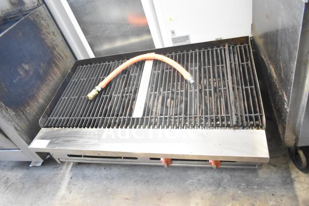 Sierra Commercial Countertop Gas Charbroiler Grill, features durable grates, visible gas hose. Used but in good condition.