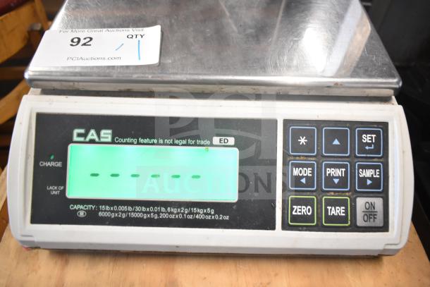 CAS ED Scale on stand with label, buttons, and digital display. Capacity and usage notes shown. Used condition.