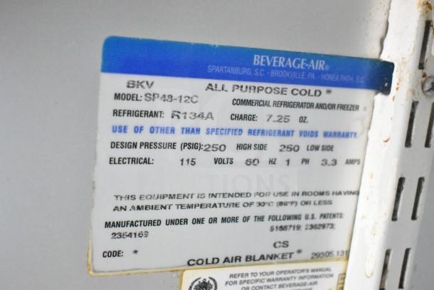Beverage Air SP48-12C commercial sandwich salad prep table label showing model, refrigerant R134A, and electrical specs.