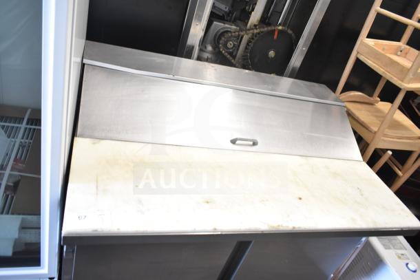 Beverage Air SP48-12C commercial prep table, stainless steel, used condition, features cutting board, 115V, 1 phase.