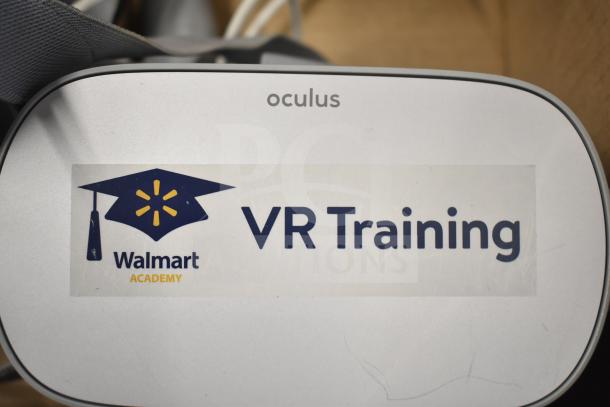 Oculus MH-A64 VR headset with "Walmart Academy VR Training" label, used condition.