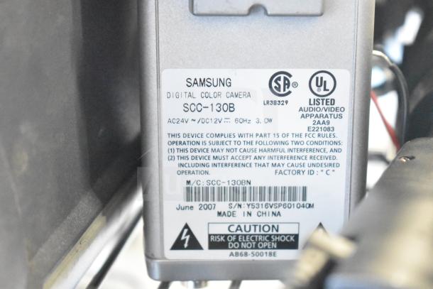 Samsung digital color camera SCC-130B label showing compliance information and manufacture date, June 2007.
