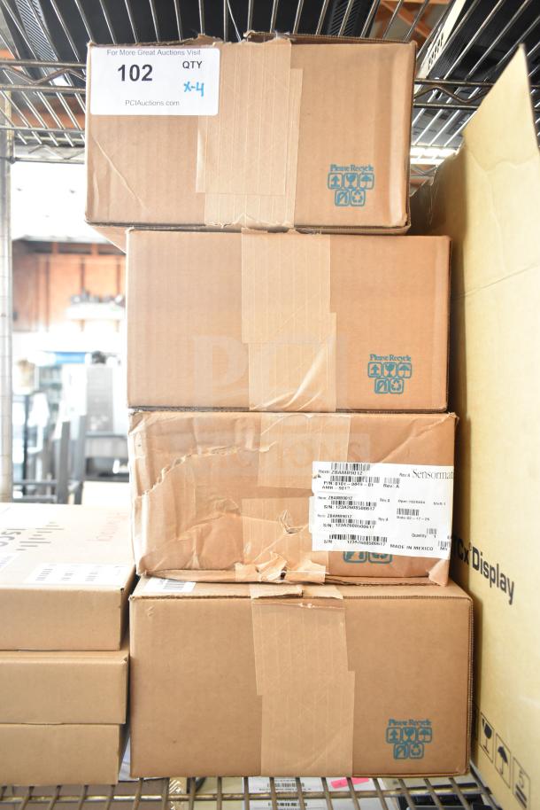 Four new Sensormatic ZBAM9012 Label Deactivator Antennas in boxes with scratch and dent conditions; labels visible.