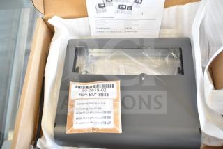 3 brand new Cisco 69-2819-02 rev A0 wireless access point mounting plates in packaging. Label shows Rev B0 and manufacturing details.