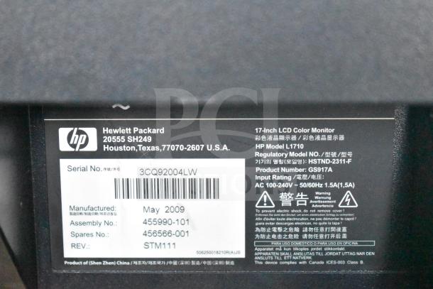 Three monitors: Dell, Onn 100002480 22", HP L1710 17". HP label shows model L1710, May 2009 manufacture.