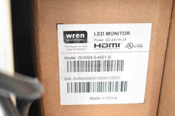 Wren Solutions GVM24-0-4001-B LED Monitor label showing model, serial number, and HDMI capability. Made in China.