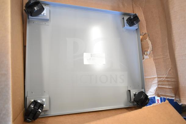 Brand new BM-138610-105346 RX printer stand with casters, scratch and dent condition, in box, label visible.