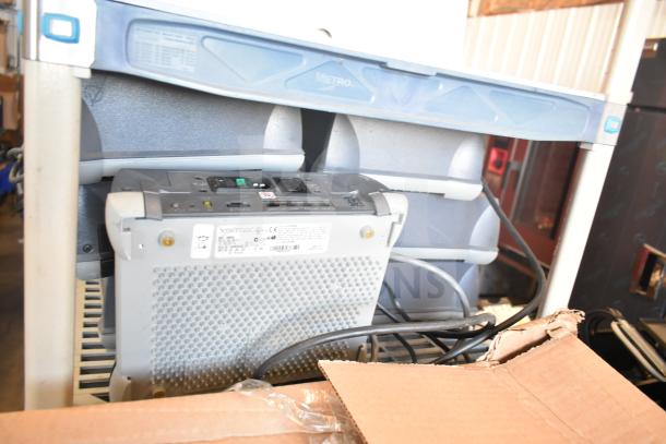 Sensormatic ZBSMPROE Antenna Deactivators, bundle of 7, with visible model labels and connection ports, in used condition.