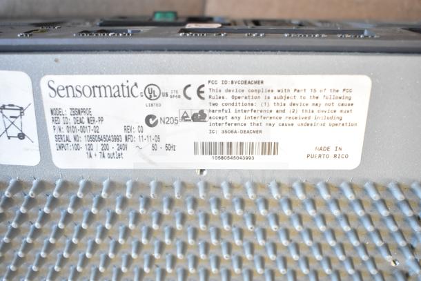 Sensormatic ZBSMPROE Antenna Deactivator, model ZBSMPROE, input 100-240V, labels on device show serial and FCC compliance.