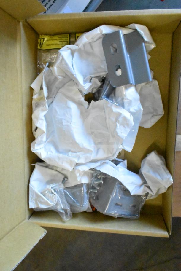 Sensormatic ZBAMB9010-IPS deactivator kit in box, including ZBAMB9012 antenna. Items wrapped, condition appears new.