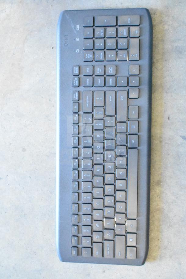 Black ONN computer keyboard, full-size, numeric keypad included, in used condition. Suitable for desktop use.