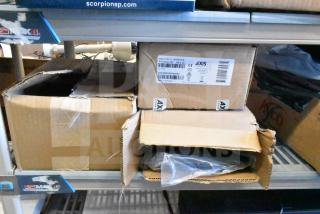 Three items including Axis T8311 Joystick with label, Sensormatic Cable in sealed boxes, indicating new condition.