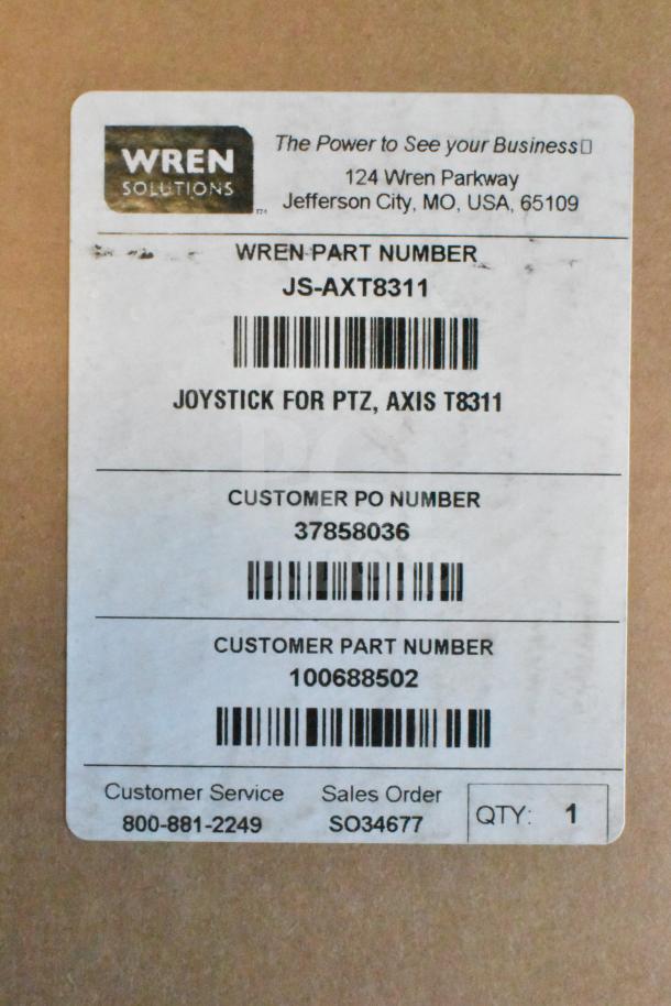 Label on box with details for Axis T8311 Joystick, including part numbers and customer information.