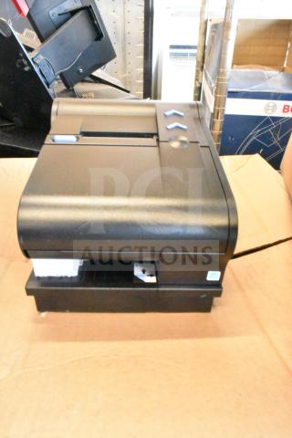 Toshiba 6145-2TC receipt printer, black, good condition, with visible button controls and indicator symbols.