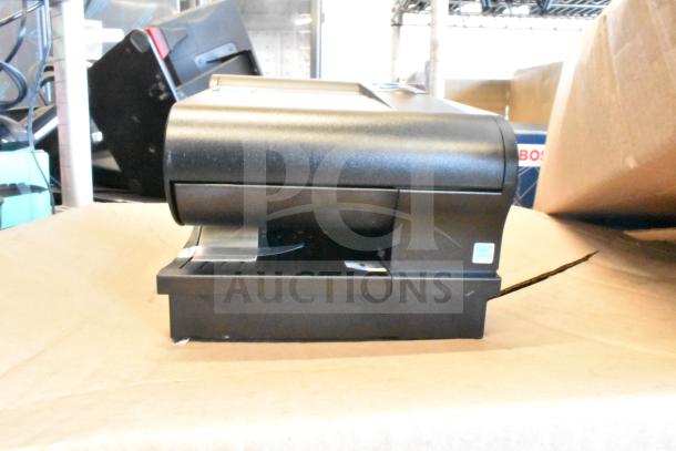 Toshiba 6145-2TC Receipt Printer, black, compact design, used condition, visible logo on side panel.