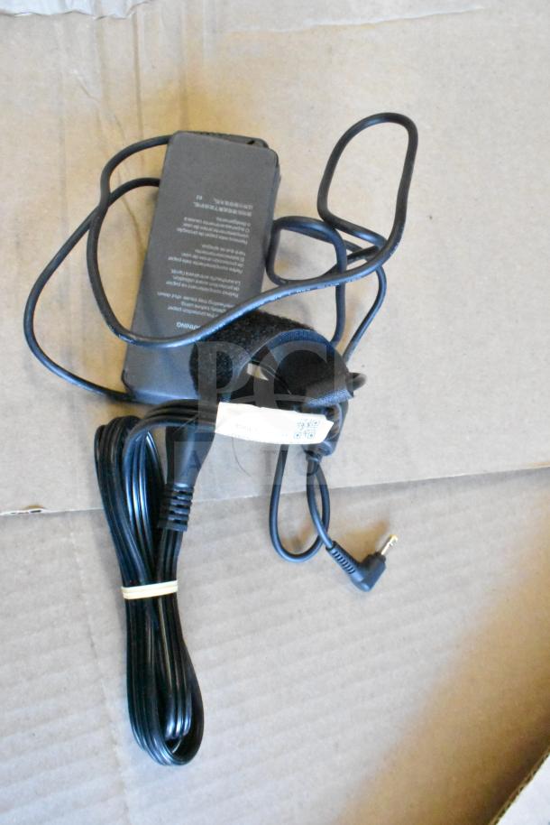 Lot of various items including an HDMI splitter and cables. Power adapter with attached cable, rubber banded cord.
