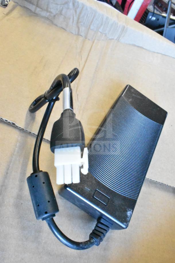 Lot of various items including a black HDMI splitter and cables, good condition, suitable for electronics setup.
