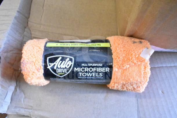 Auto Drive multipurpose microfiber towel, orange, 14x14 inches, in packaging. Part of a mixed auction lot.