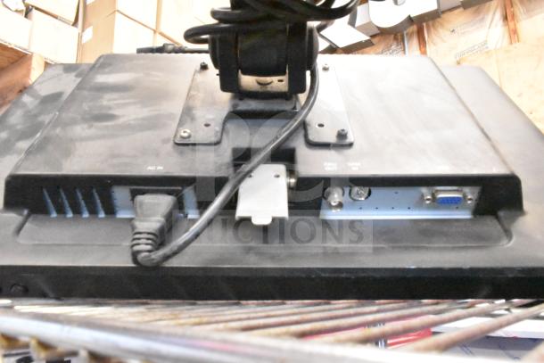 Four monitors including Costar, HP Compaq LE1711, Elo TouchSystems, Acer S240HL. Visible ports and cables. Used condition.