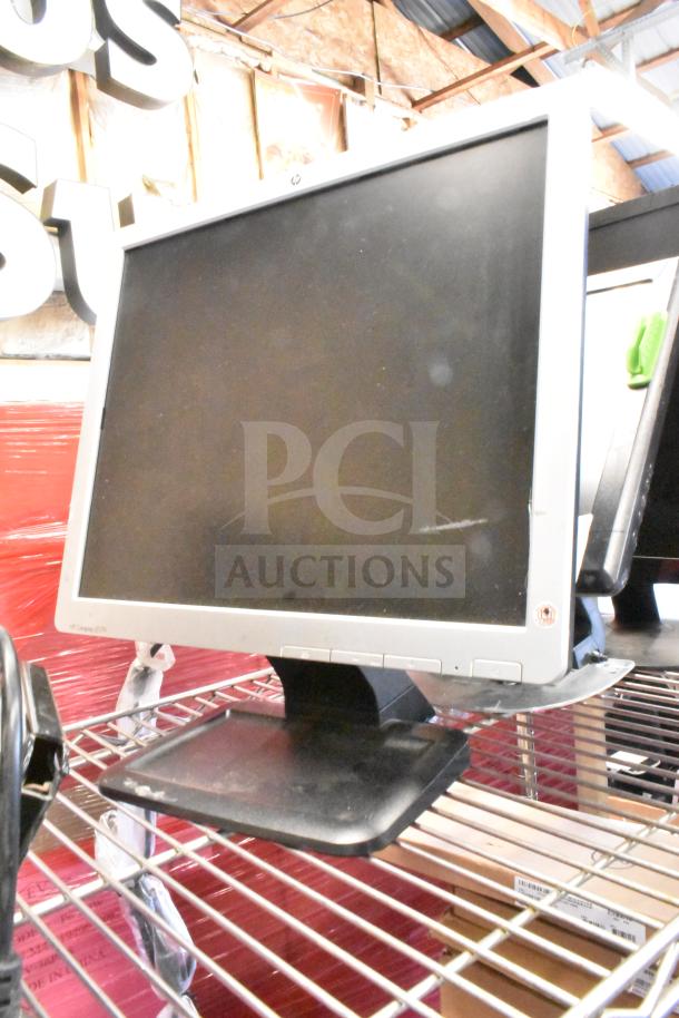 Four mixed monitors including Costar, HP Compaq LE1711, Elo TouchSystems, Acer S240HL. Bid for all four units.