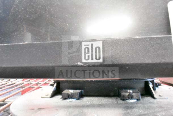 Four monitors including Costar, HP Compaq LE1711, Elo TouchSystems, Acer S240HL, showcasing Elo branding.