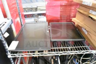 Two monitors on a shelf: HP E222 and Dell E1715S. Good condition, ready for bidding.