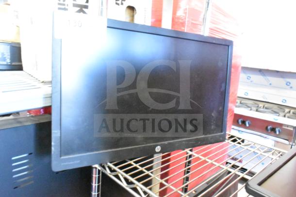 Two monitors: HP E222 and Dell E1715S. HP monitor displayed, fair condition. Auction offers two times your bid.