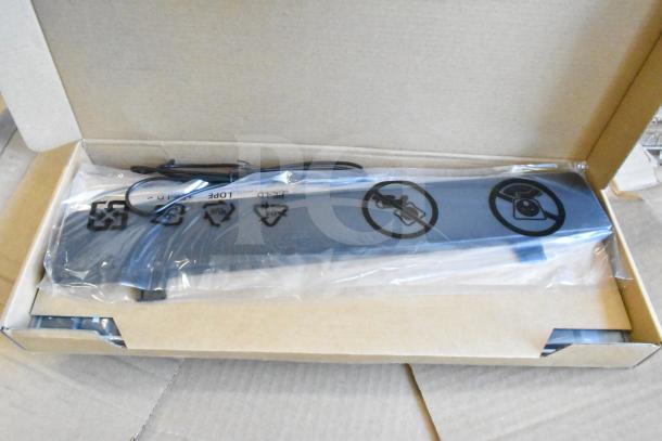 "Nine items including a Dell keyboard in packaging, showing caution symbols. Auction lot multiples value by nine."