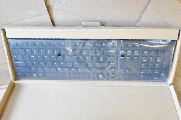 Dell keyboard in original packaging, black, new condition, part of a lot of 9 items.
